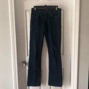 Low-rise, wide-leg (boot cut), dark wash jeans